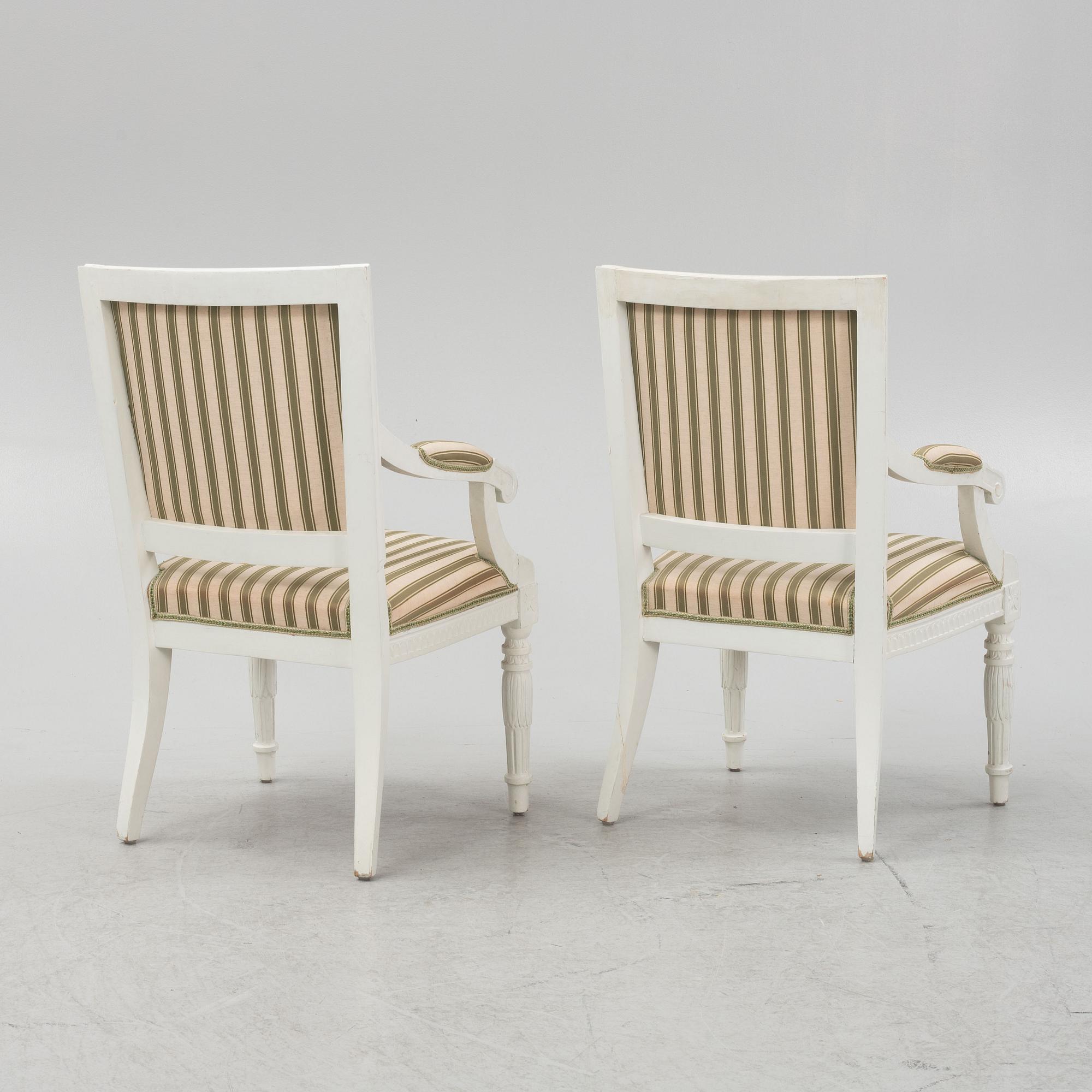 A pair of Gustavian style armchairs, around 1900.
