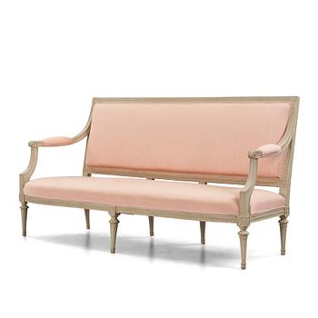 A Gustavian carved sofa, later part of the 18th century.