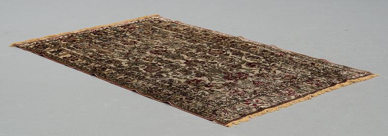 A carpet, an antique silk metal brocaded Kashan, probably around 1910, ca 200-202,5 x 129-131 cm.