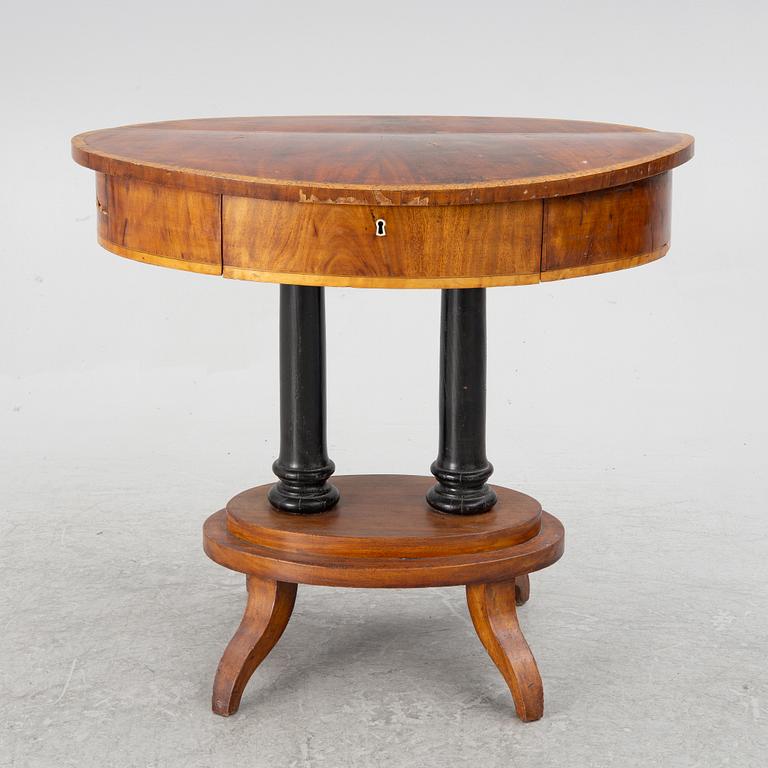 An Empire sewing table, mid-19th Century.