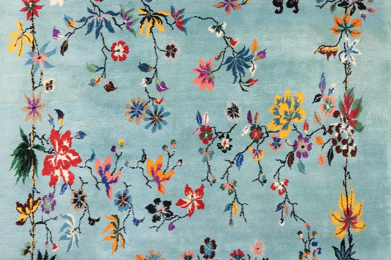 An oriental carpet, a. 370 x 261 cm.