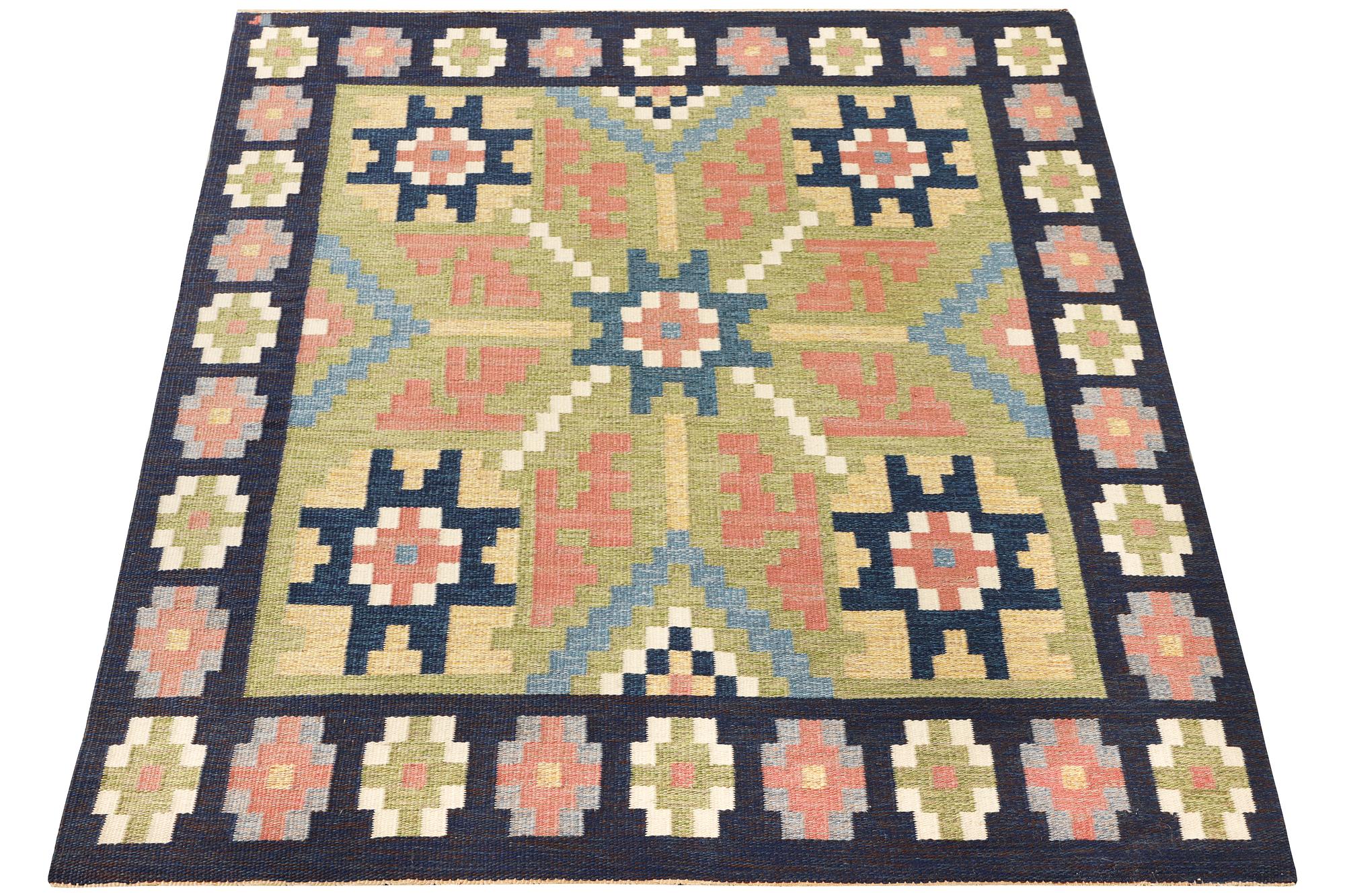 Erik Lundberg, a flat weave carpet, c. 240 x 173 cm.