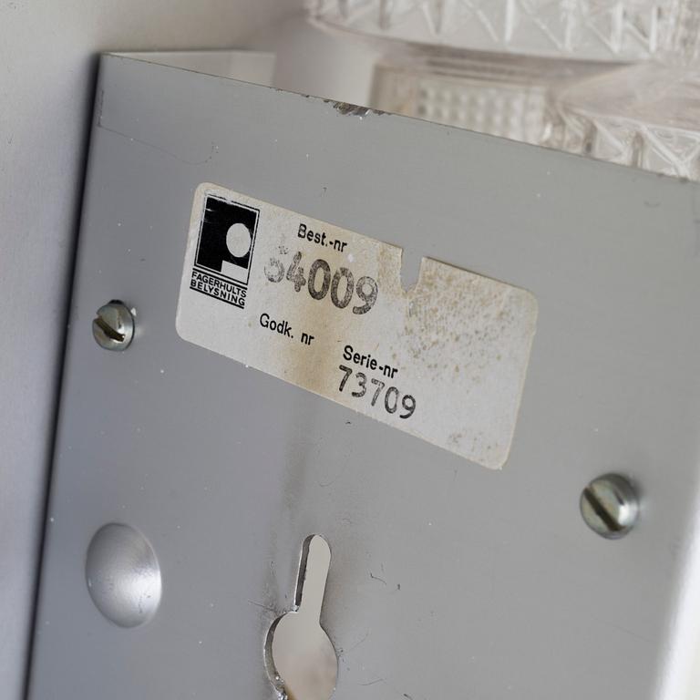 A pair of wall lamps by Gert Nyström for Fagerhult, second half of the 20th century.