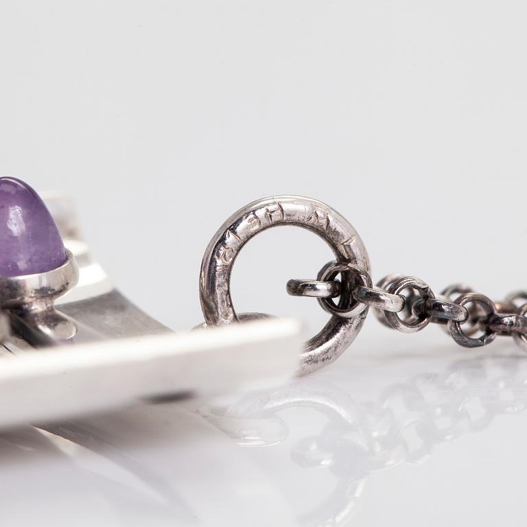 Elis Kauppi, a silver and amethyst pendant, Kupittaan Kulta, Turku 1964, with chain in sterling silver.