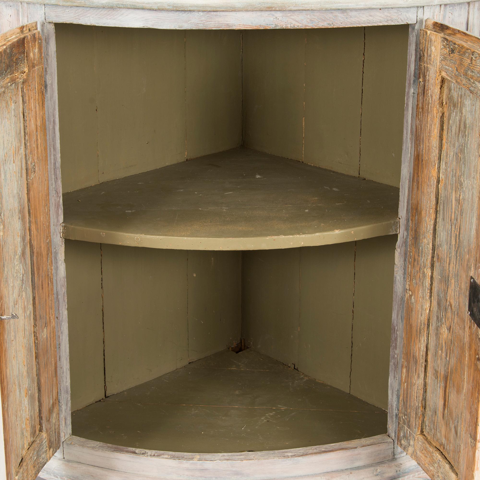 A Swedish Gustavian corner cabinet, circa 1800.