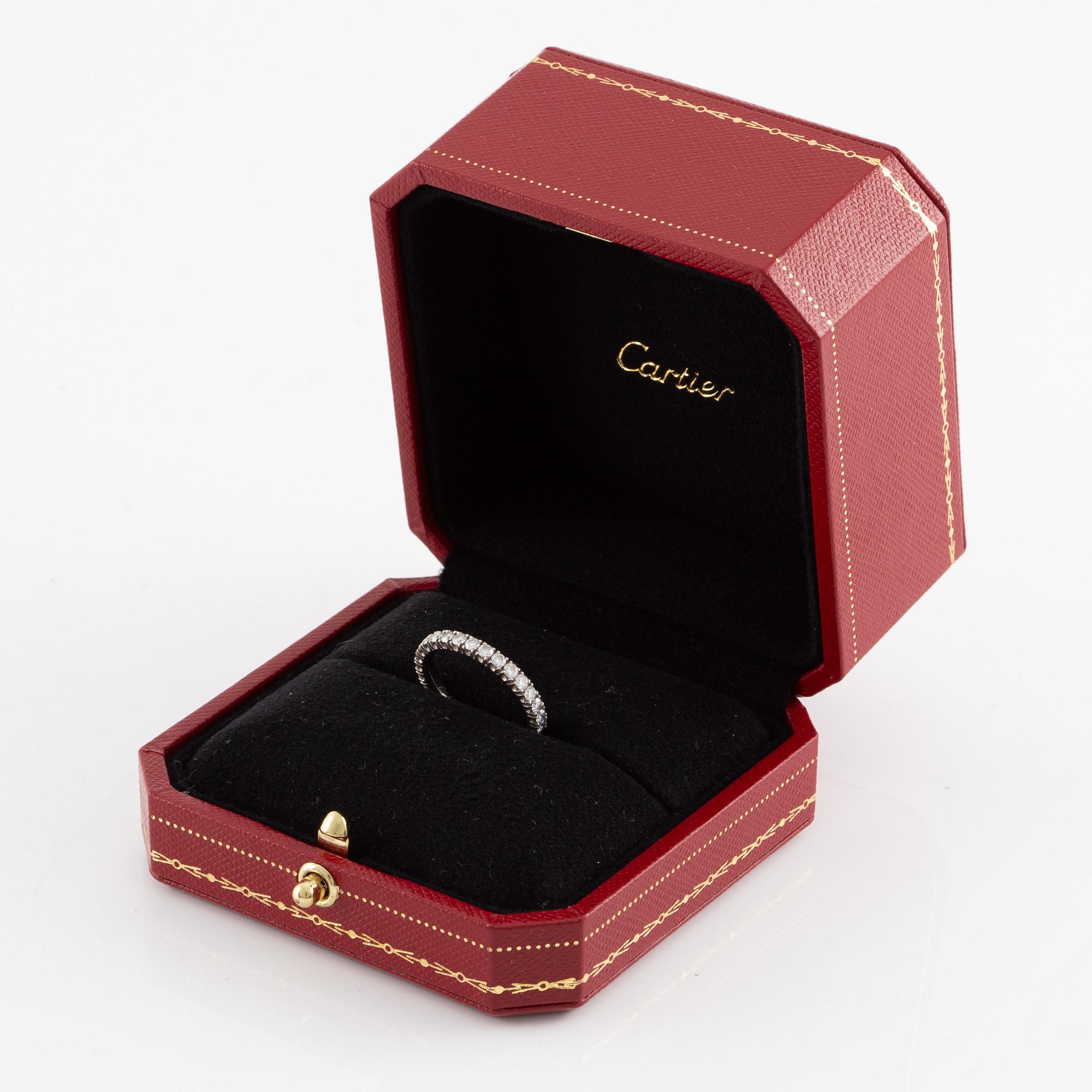 Cartier eternity ring in platinum with round brilliant-cut diamonds.