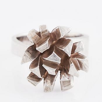 Rey Urban, a sterling silver ring.