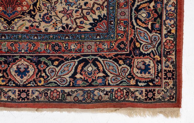 An oriental carpet, c. 370 x 275 cm.