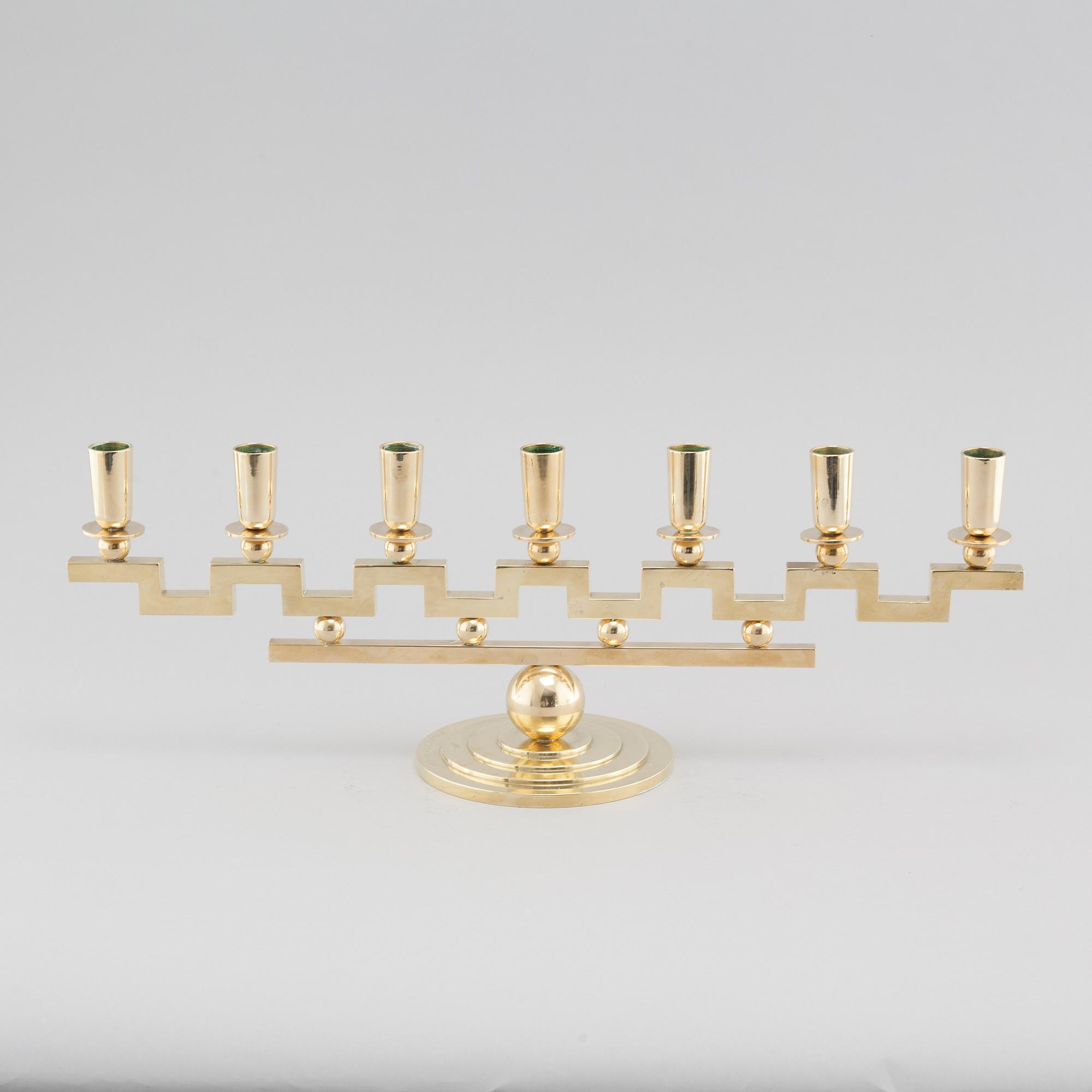A brass candelabra, attributed to Firma Lars Holmström in Arvika, 20th cenutry.