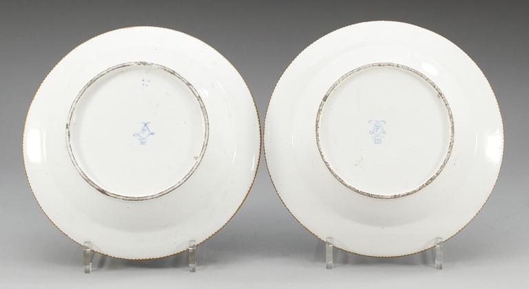 A pair of French Sèvres 'bleu celeste ground' soup dishes, 18th Century.