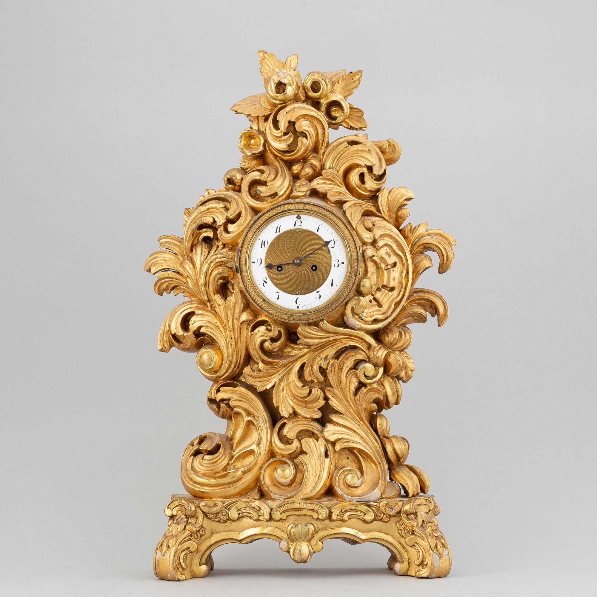 A rococo style table clock, 19th Century.