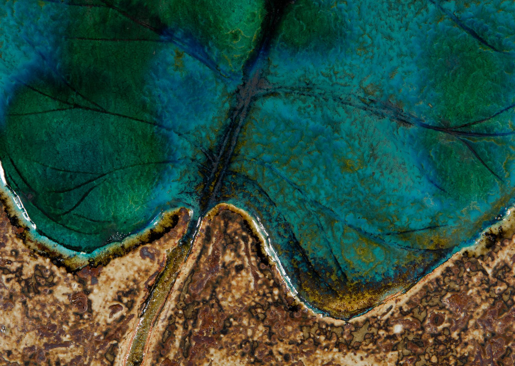 Annikki Hovisaari, a stoneware relief, signed AH ARABIA.