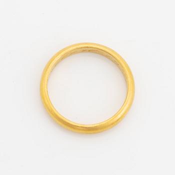 23K gold ring.