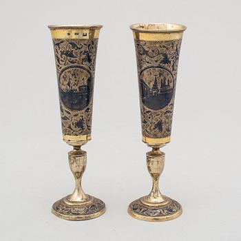 Two similar silver-gilt champagne flutes, unidentified makers mark, Moscow 1843.