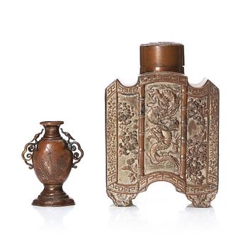 813. A silvered copper alloy tea caddy and a gilded copper alloy vase, unidentified makers, 19th Century.