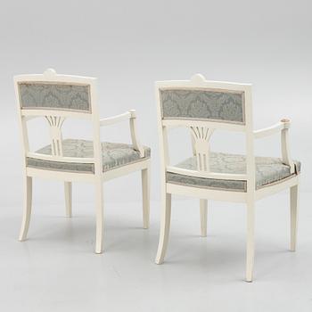 A pair of Empire style armchairs, 20th century.