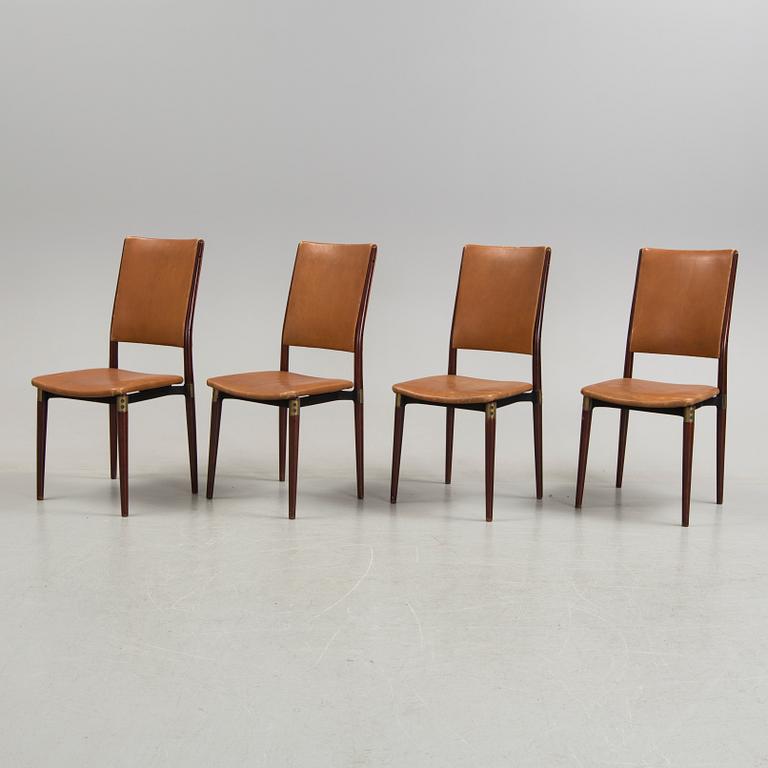 A set of four chairs by Osvaldo Borsani, Tecno, Italy.