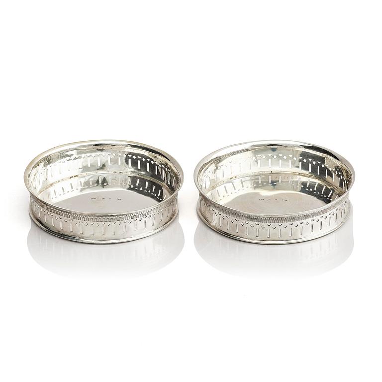 A pair of Swedish 19th century silver coasters, marks of Pehr Olof Bäckström, Gävle 1831 and 1832.