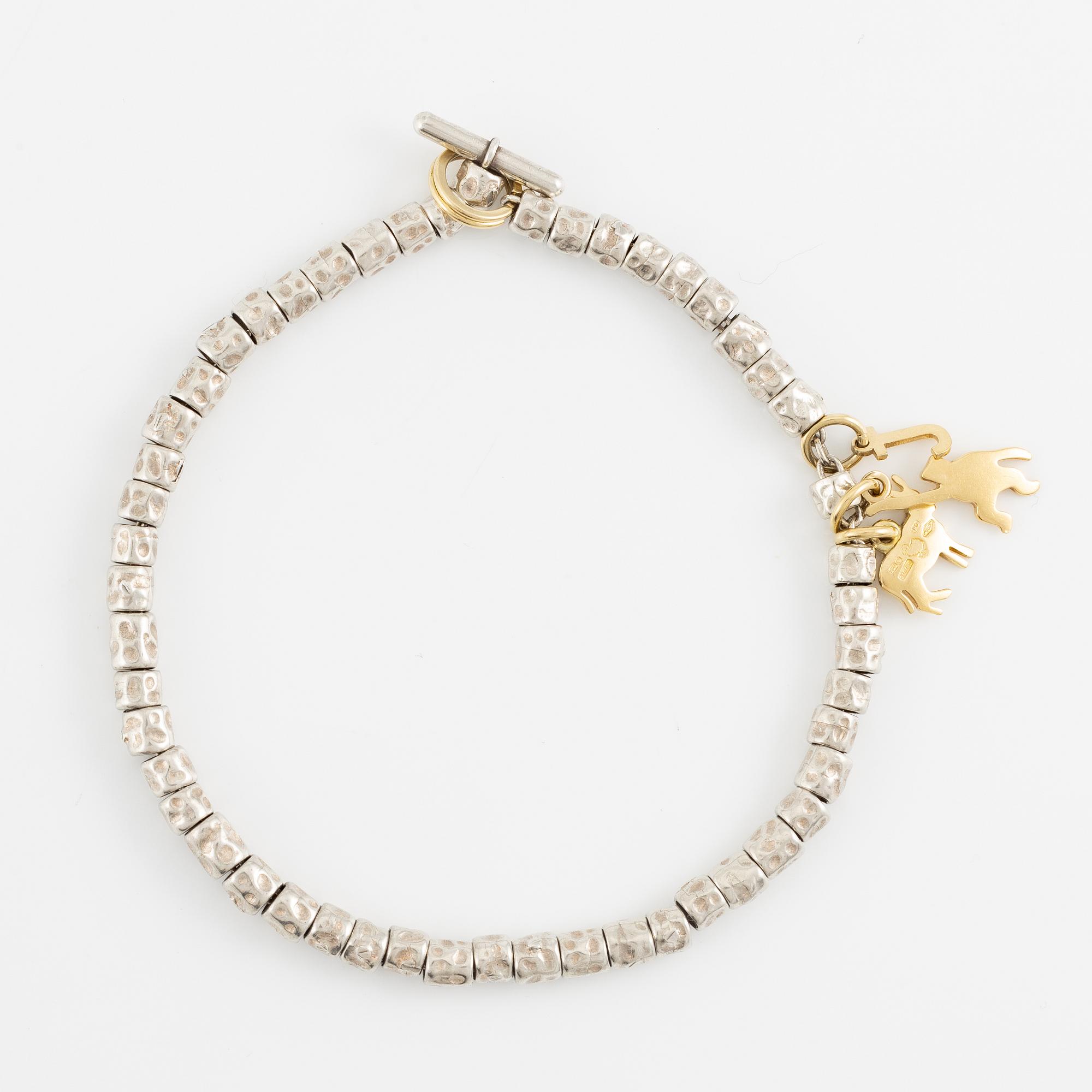 Pomellato, bracelet, "Dodo", silver with gold charms.