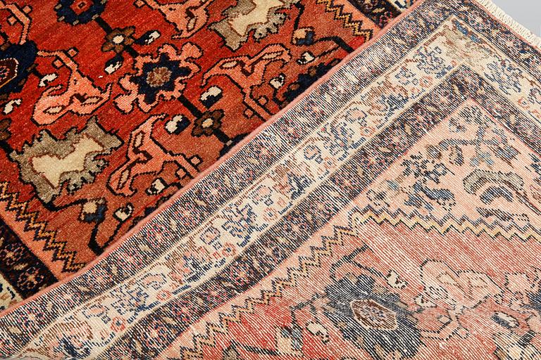 A semi-antique Malayer runner, c. 408 x 106 cm.