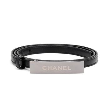 643. CHANEL, a black leather belt.