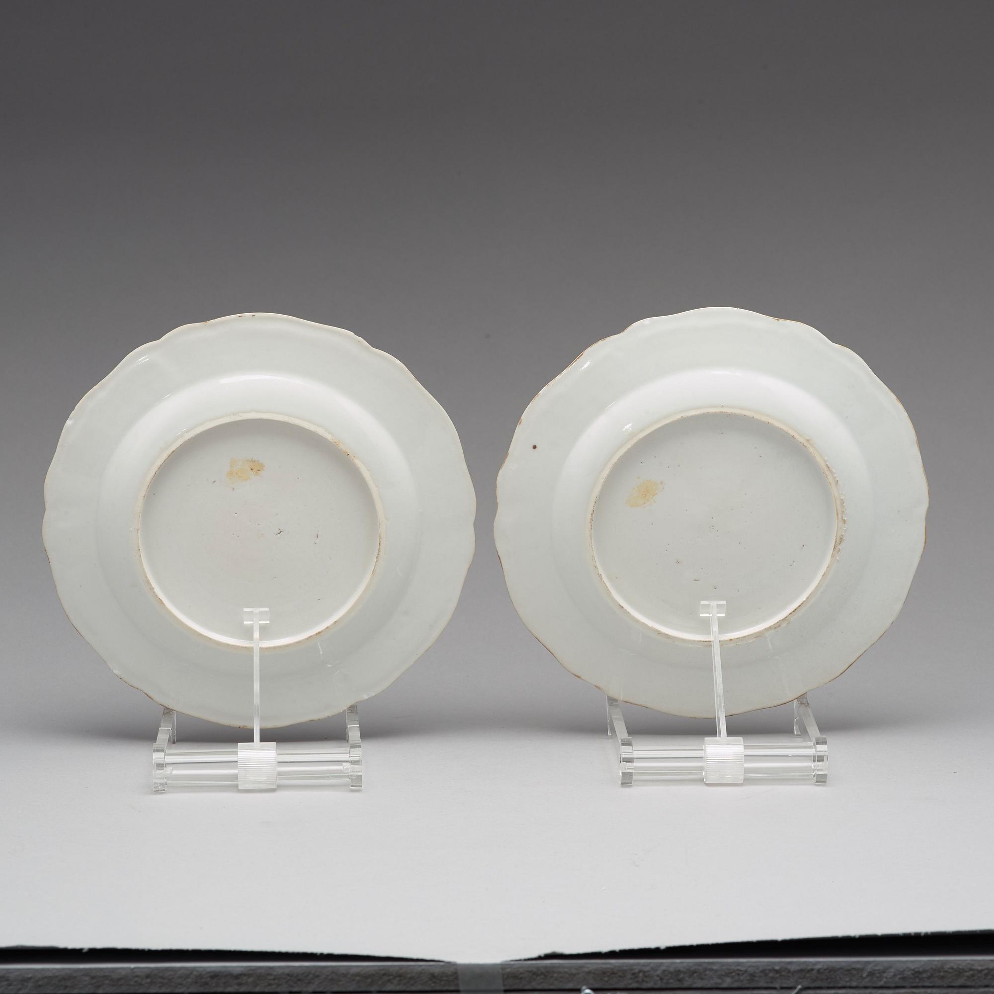 A pair of armorial famille rose plates, Qing dynasty, Qianlong (1736-95).
