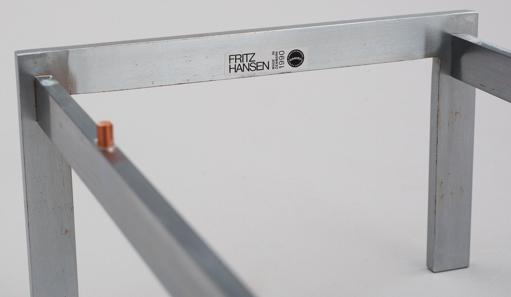 A Poul Kjaerholm marble and steel table, Fritz Hansen, Denmark 1990.