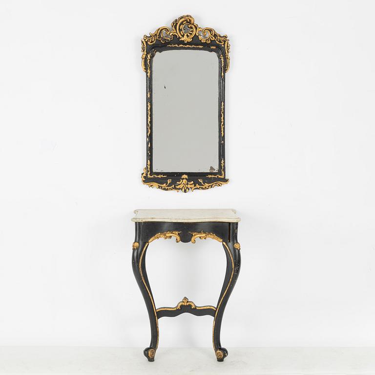 A Rococo revival mirror and a console table, second half of the 20th Century.