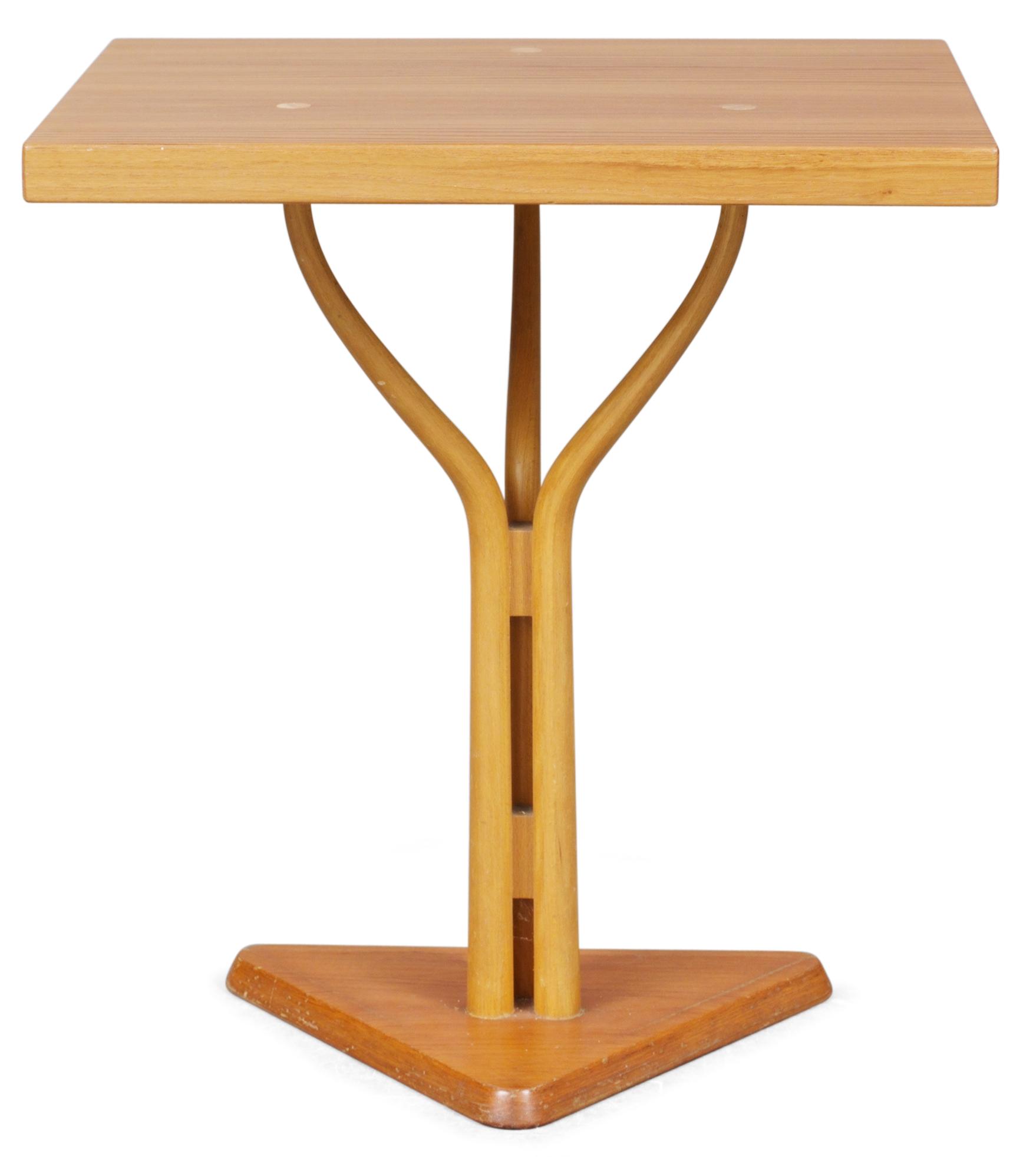 A Carl- Axel Acking oregon pine table by Nordiska Kompaniet for the Hotel Malmen ca 1949-51.