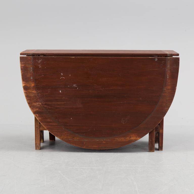 A 19th century painted flap table.