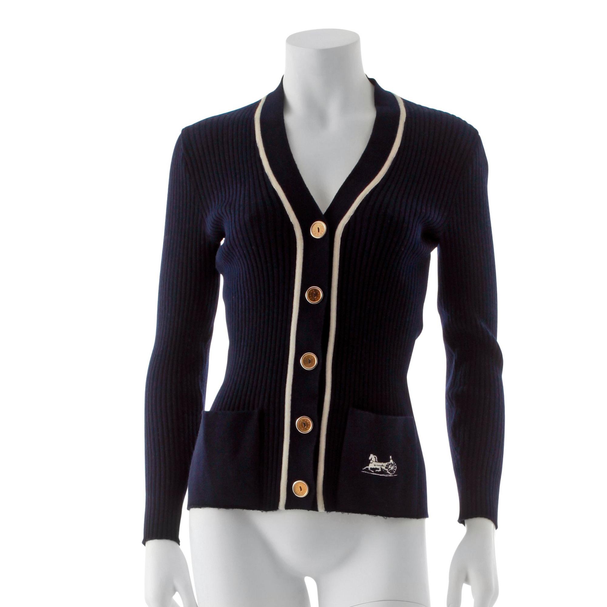 CÉLINE, a navy blue cardigan.