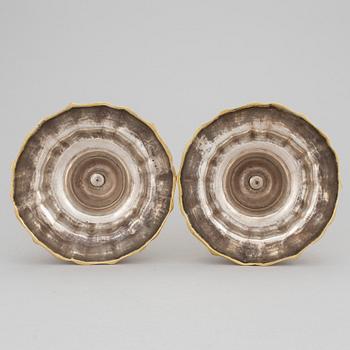 A pair of argent haché candlesticks, mid 18th century.