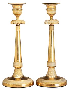 615. A pair of late Gustavian gilt bronze candlesticks.