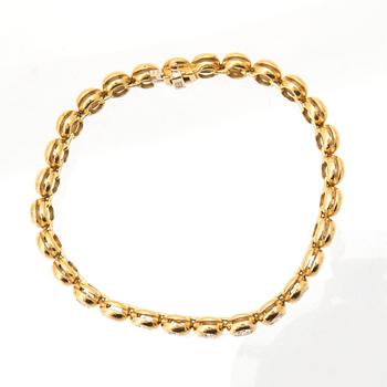 Tennisarmband 18K guld och runda briljantslipade diamanter.