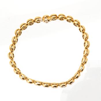 Tennisarmband 18K guld och runda briljantslipade diamanter.