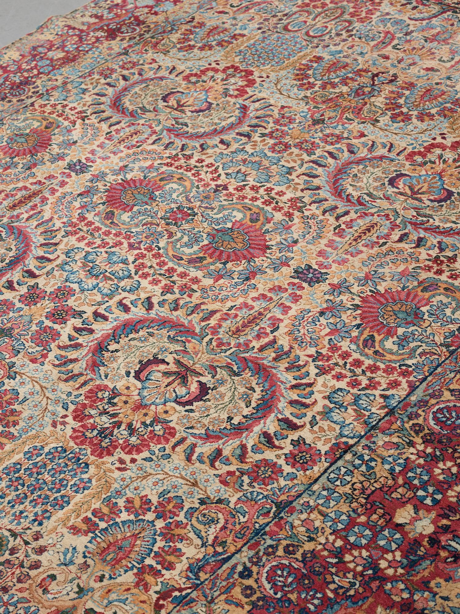 A carpet, a semi-antique Kerman, ca 375-379,5 x 268-271 cm.