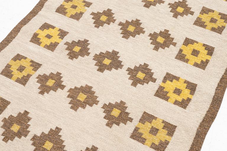Ilsalestalon Mattolutomo, a flat weave rug, Kaukaba, Finland, signed ILS, c. 215 x 125 cm.