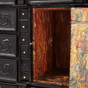 A South-German Baroque ebonized collector's cabinet on stand, circa 1700.