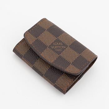 Louis Vuitton, a pair of cufflinks in a damier ebene case.