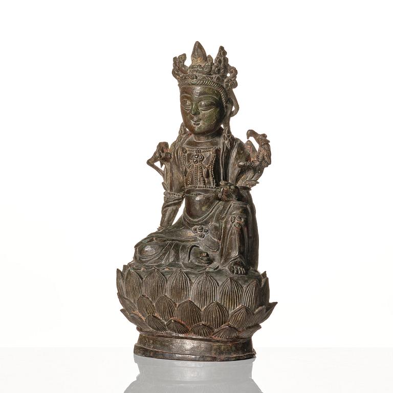 A bronze figure of Guanyin, late Ming dynasty (1368-1644).