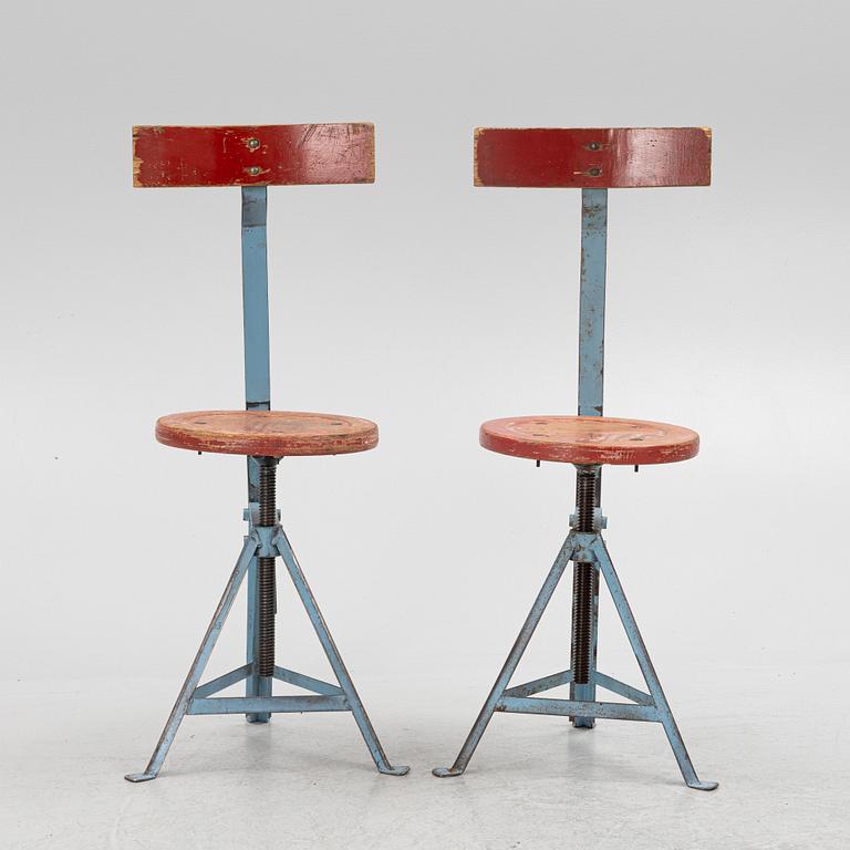 A pair of industry style chairs, Poland.