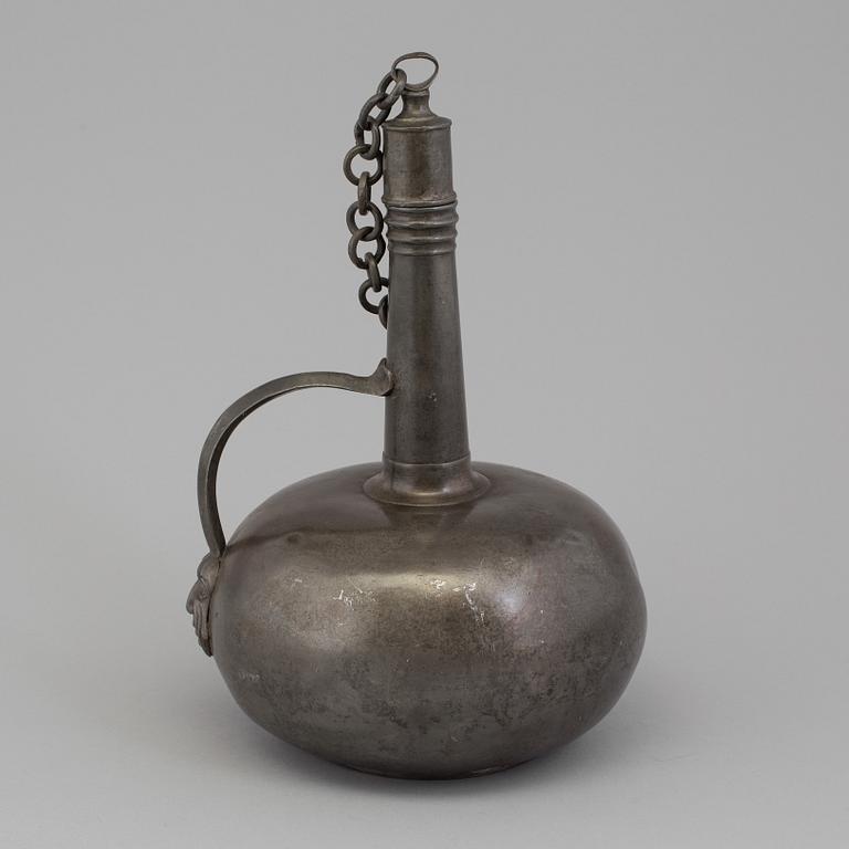 A PEWTER WINE JUG, first half of the 19th century.