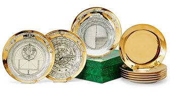 11. A set of three Piero Fornasetti 'Astro Labio' porcelain plates and six gilded dishes, Milan, Italy.