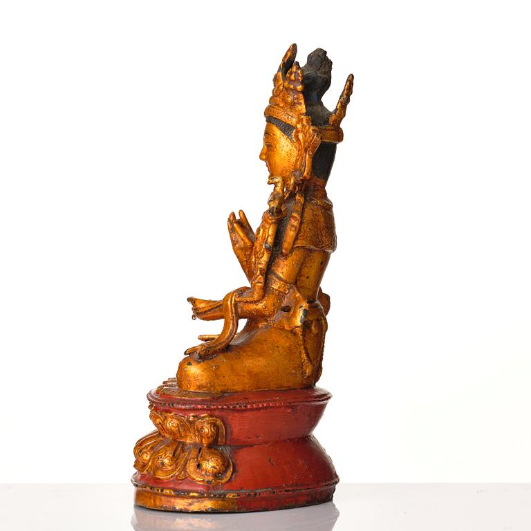 A gilt lacquer bronze figure of Avalokiteshvara, Ming dynasty (1368-1644).