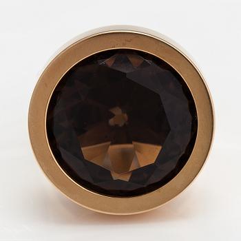 Elis Kauppi, A 14K gold ring with a smoky quartz. Kupittaan kulta, Turku 1972.