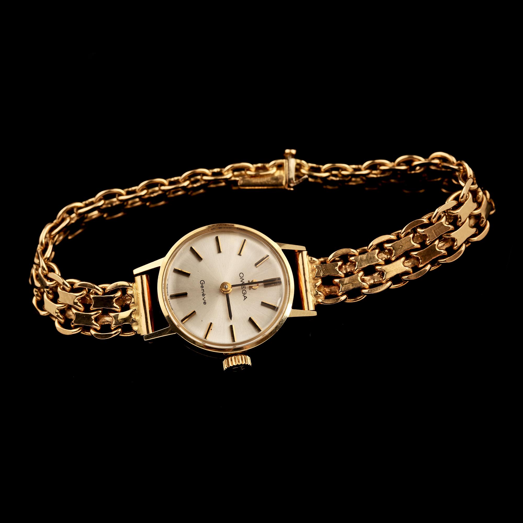 DAMARMBANDSUR, Omega med x-länk i 18 k guld. Vikt 23 g.