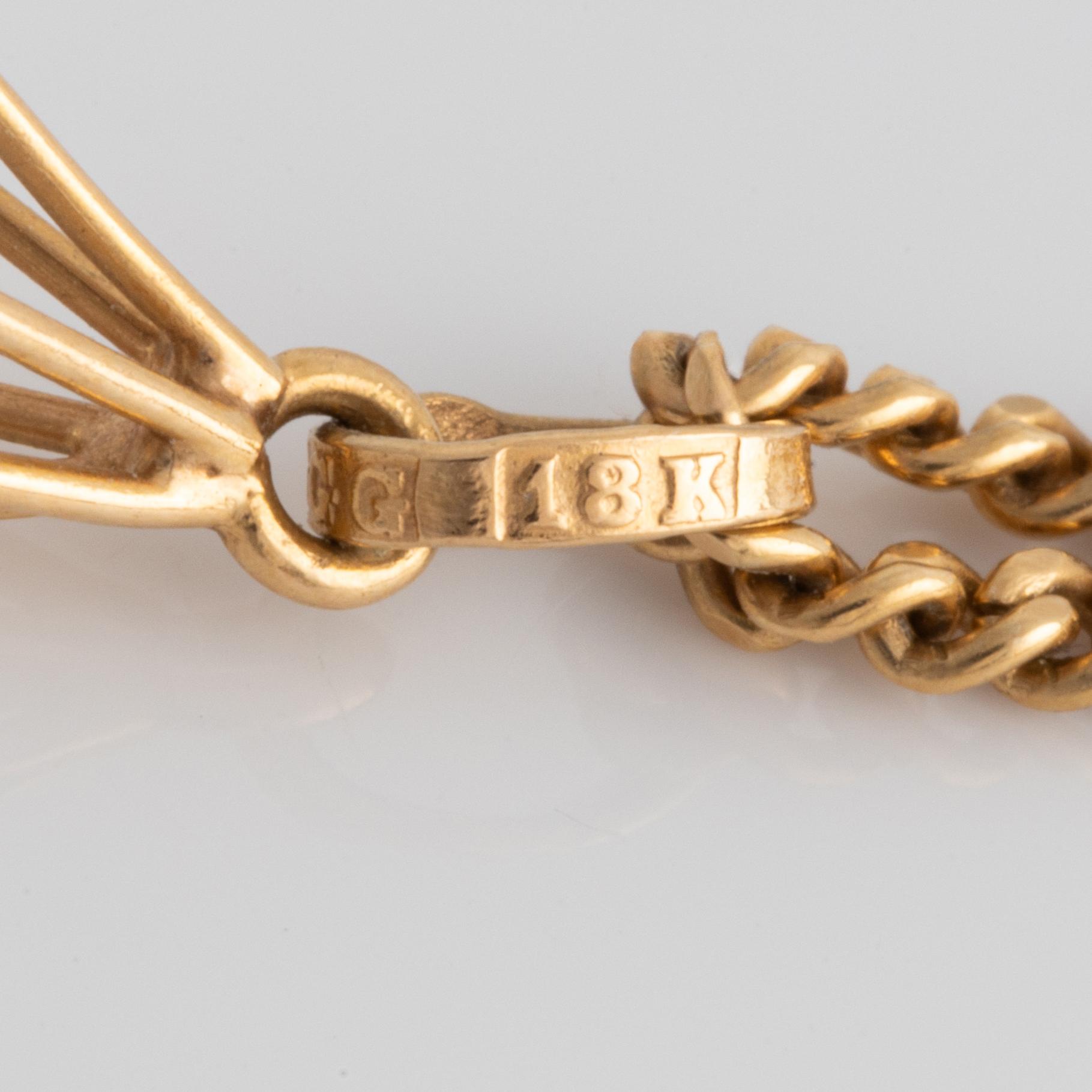 Hängsmycke, guld med pärla.