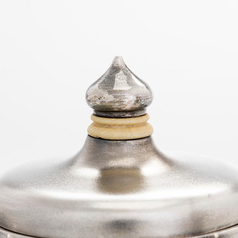 A four-piece silver coffee set, St. Petersburg 1887, original fitted box from Khlebnikov. Sugar tong, Moscow around 190.