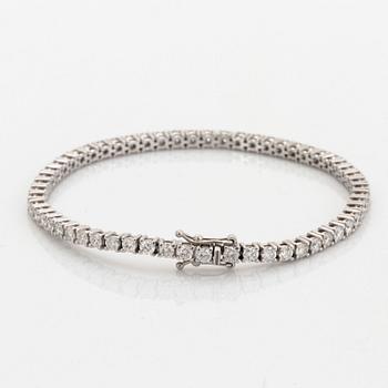 Brilliant-cut diamond tennis bracelet, with report HRD.