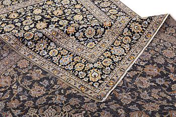 A Kashan carpet, signed, c. 410 x 270 cm.
